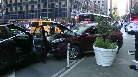 SUV plows into pedestrians on a busy New York City sidewalk while fleeing from police